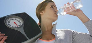 صورة: ممارسة التمارين الرياضية و اتباع حمية غذائية