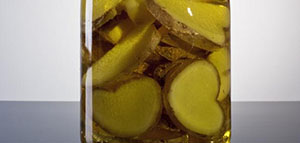 صورة: زيت الزيتون والزنجبيل و فوائد دهن البطن بزيت الزيتون والزنجبيل