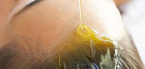 صورة: زيت الشعر و كيفية استخدام حمامات زيت للشعر